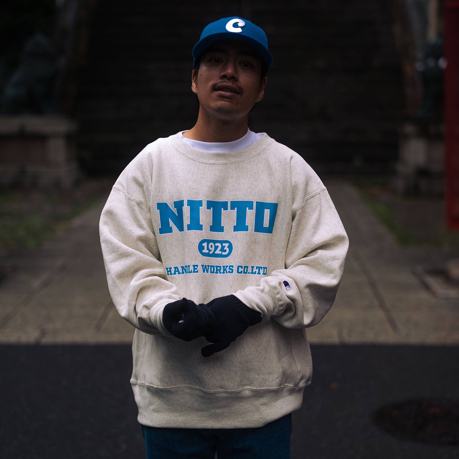 CHAMPION NITTO Collage Logo