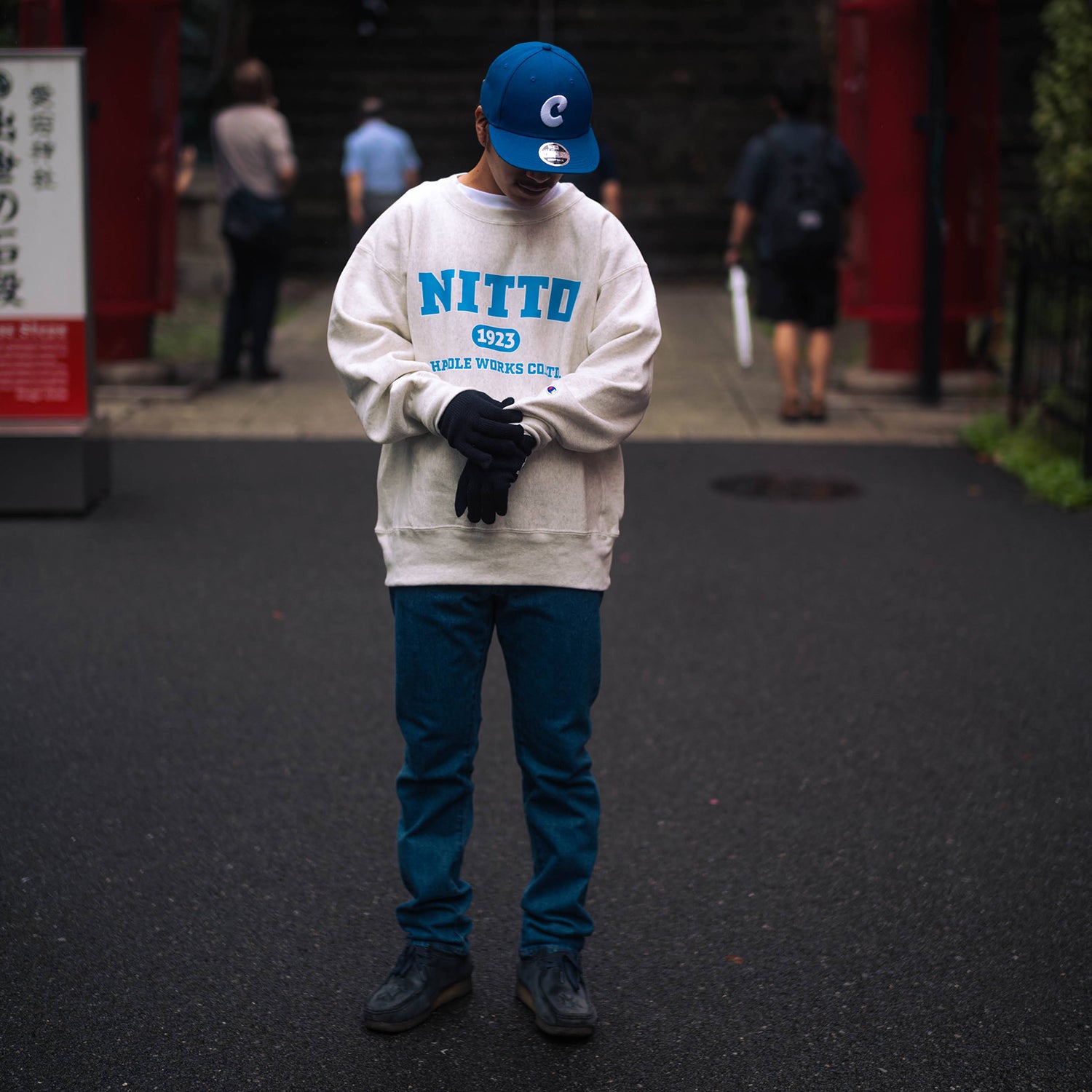 CHAMPION NITTO Collage Logo