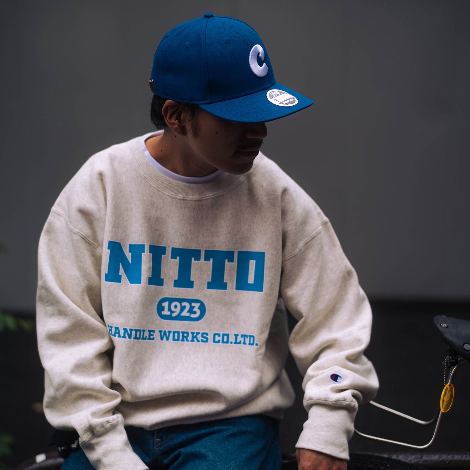 CHAMPION NITTO Collage Logo